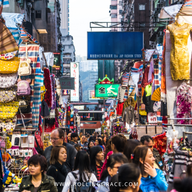 Ladies’ Market on Tung Choi Street with clothing stalls and shoppers