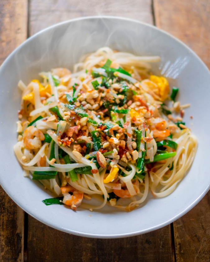 Vegetarian pad thai with rice noodles, tofu, bean sprouts, and peanuts
