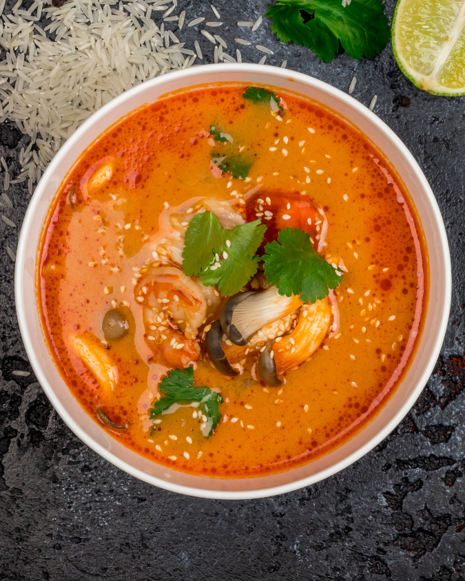 Vegetarian tom yum soup with mushrooms, lemongrass, and kaffir lime leaves