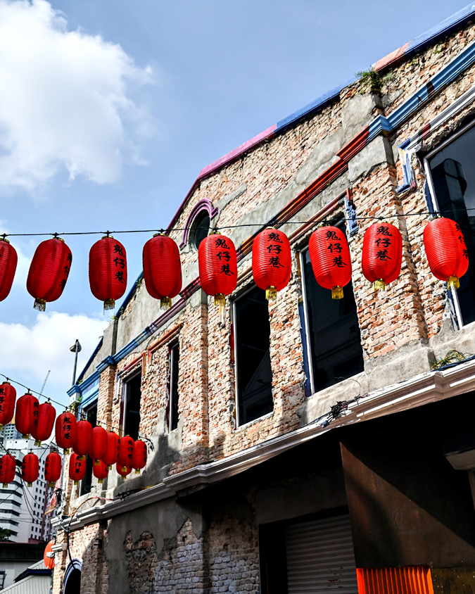 Red lanterns hanging above Petaling Street in Kuala Lumpur Chinatown