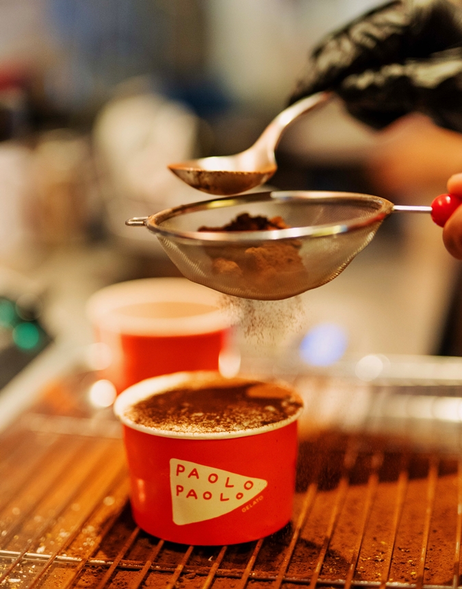 Nespresso coffee being poured over artisanal gelato during the Nespresso x Paolo Paolo Gelato summer collaboration