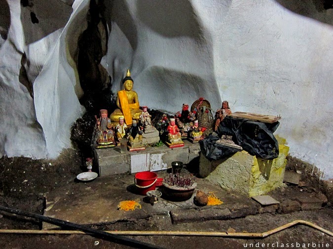 Small religious altars scattered inside Gua Charas cave