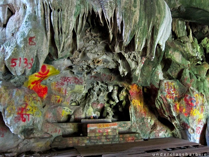 Textured limestone walls inside Gua Charas temple cave in Kuantan