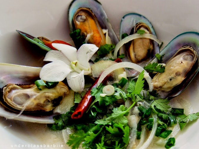 Greenshell mussels cooked in Thai-style broth with herbs, chillies, and kaffir lime leaves