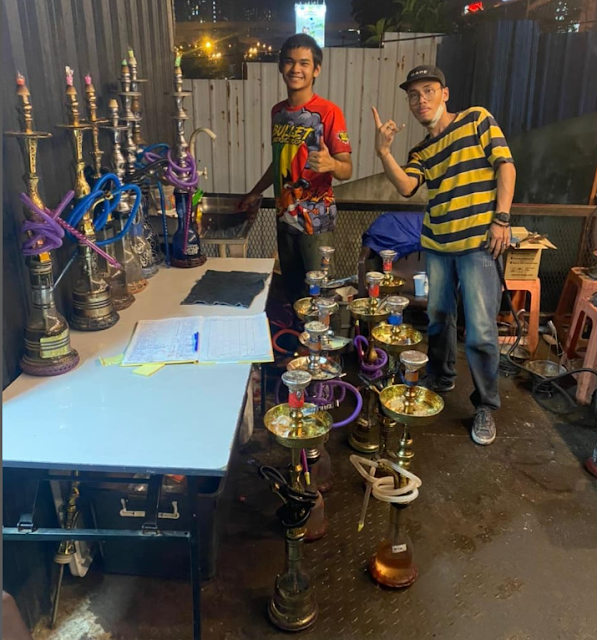 6 Best Shisha in TTDI: Top Hookah at Taman Tun Dr Ismail 5 Guests preparing Shisha at Pitstop Shisha, The Podium Penchala