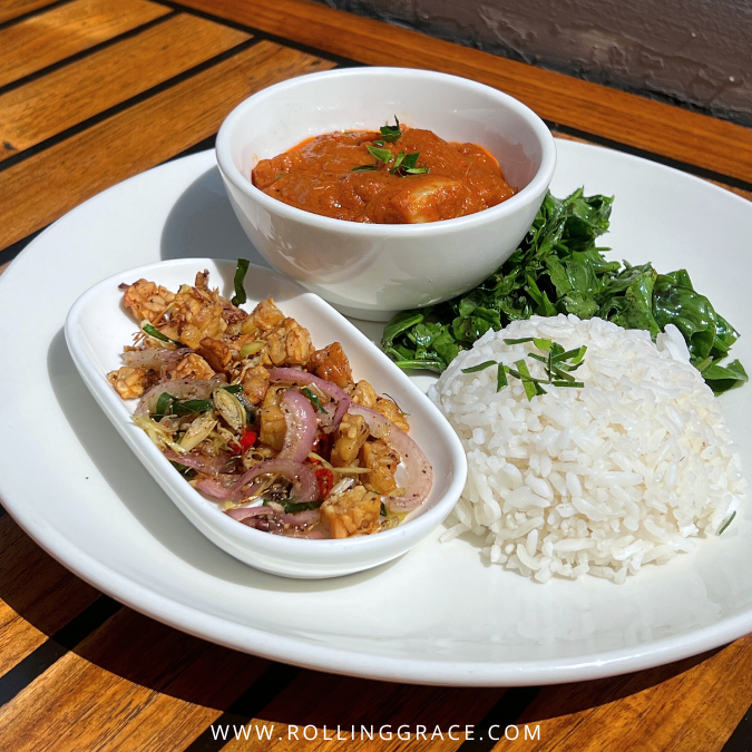 Plate of rice and curry at The Fat Frog Langkawi with sides and sauce