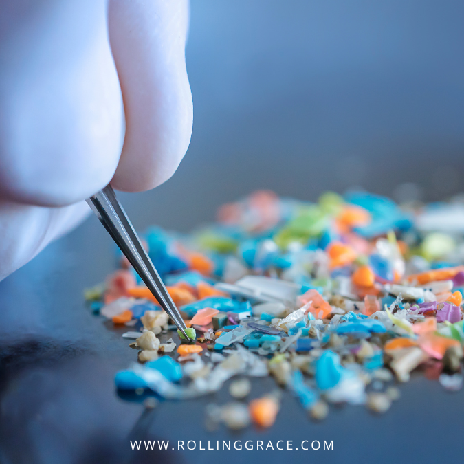 Tweezers picking up colourful microplastic fragments, plastic contamination in Malaysian food