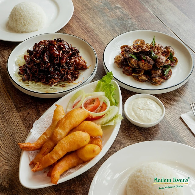 Malaysian dishes including nasi lemak and satay at Madam Kwan's Mid Valley Megamall Kuala Lumpur