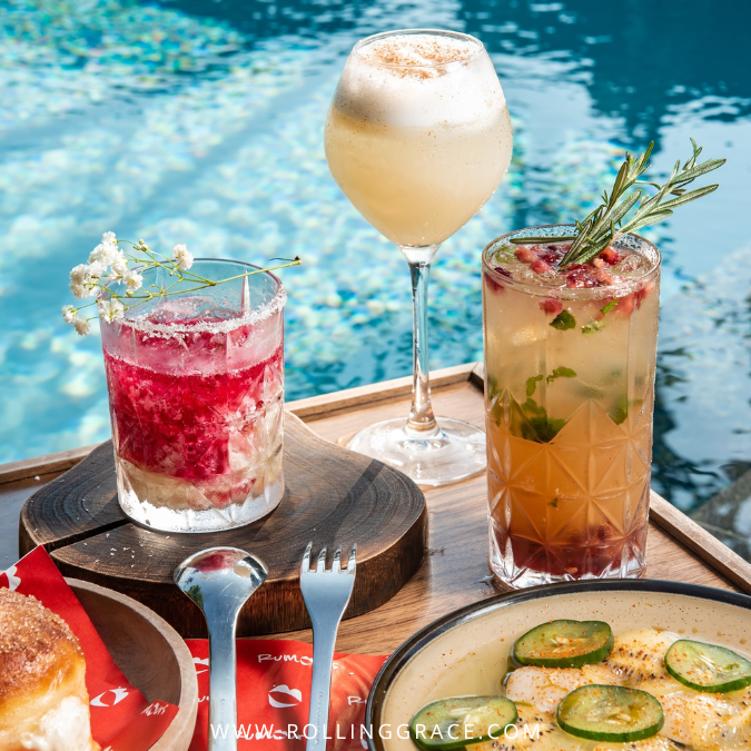 Tropical cocktails by the pool at Rumours Beach Club Siloso Beach Singapore