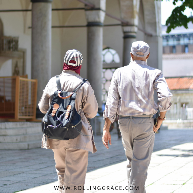 A couple walking through a quiet Sarajevo street
