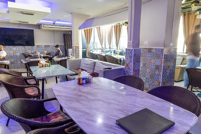 Bright dining room interior at Marouch restaurant Bangkok Thailand