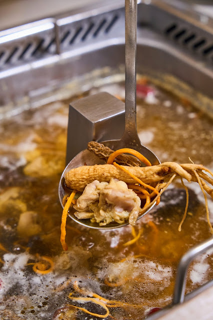 Haidilao hotpot with Sichuan broth and fresh ingredients at Sunway Velocity Mall, Kuala Lumpur