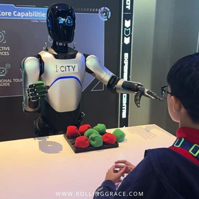 Humanoid robot interacting with children during a demonstration at the AI World Experience Centre in i-City.