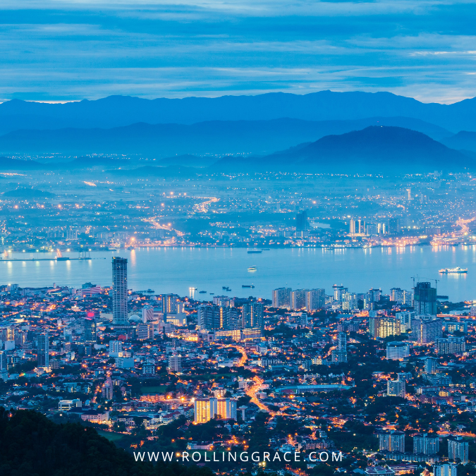 Pulau Pinang coastline and cityscape with sea, hills and urban buildings