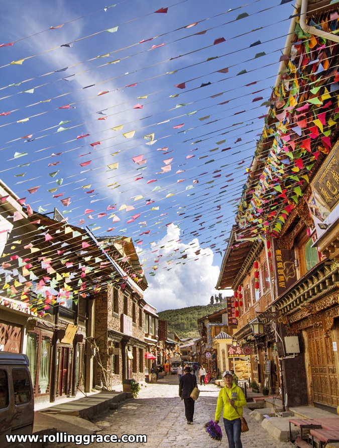 Dukezong Ancient Town street in Shangri-La decorated with prayer flags