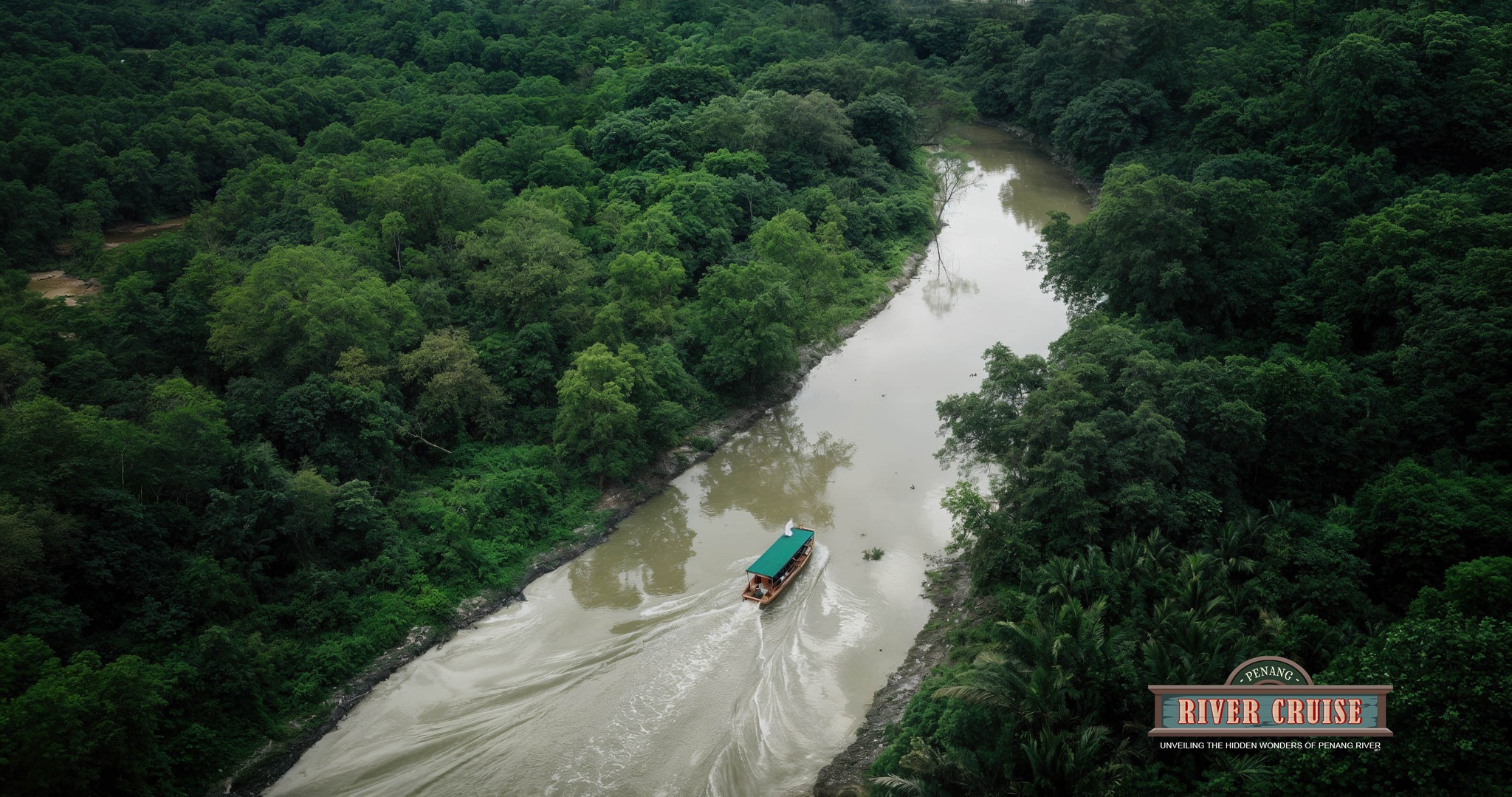 Rolling Grace 2026 Giveaway: Win Penang River Cruise Tickets 3 Boat travelling along the Penang River surrounded by greenery during a river cruise