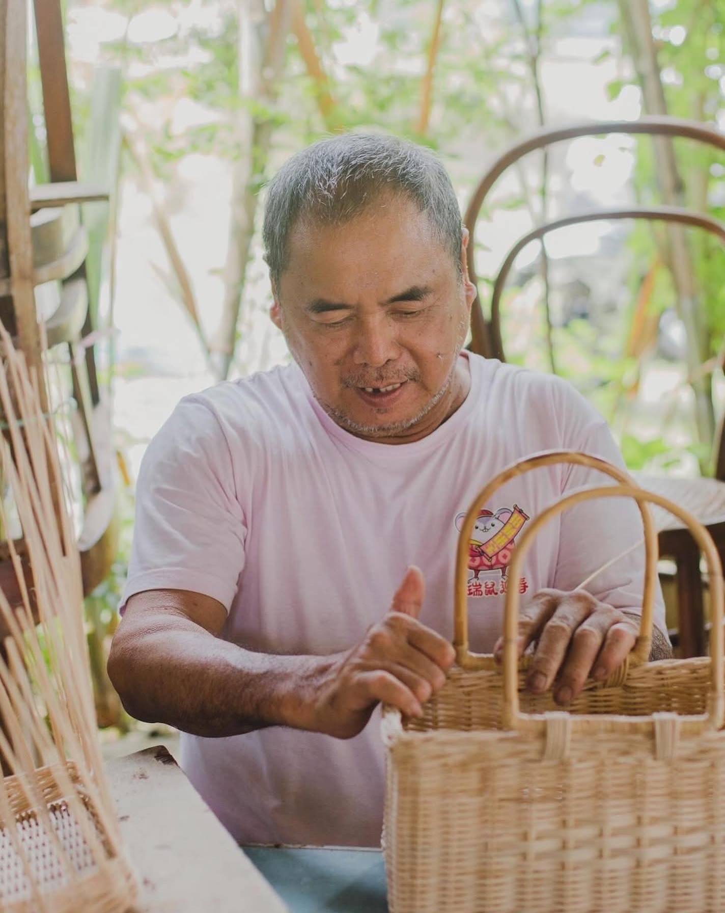Malaysian artisan weaving handcrafted basket for Earth Heir fair trade collective