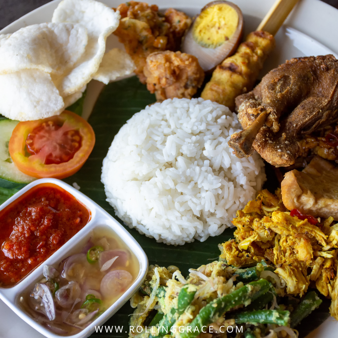 Nasi campur Indonesia served with assorted side dishes and sambal