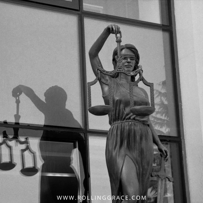 Statue of Lady Justice representing laws and criminal penalties for child sexual abuse