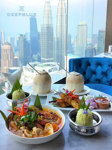 DEEP BLUE rooftop restaurant at THE FACE Suites overlooking KLCC skyline