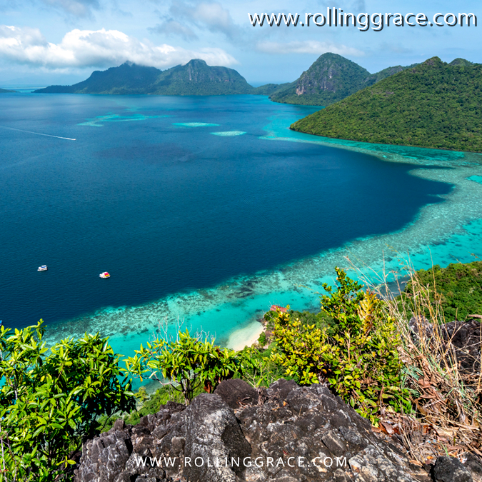 10 Most Beautiful Islands in Sabah Malaysia You Must Visit 4 Aerial view of Pulau Bohey Dulang Sabah with coral reef, turquoise lagoon and forested hills