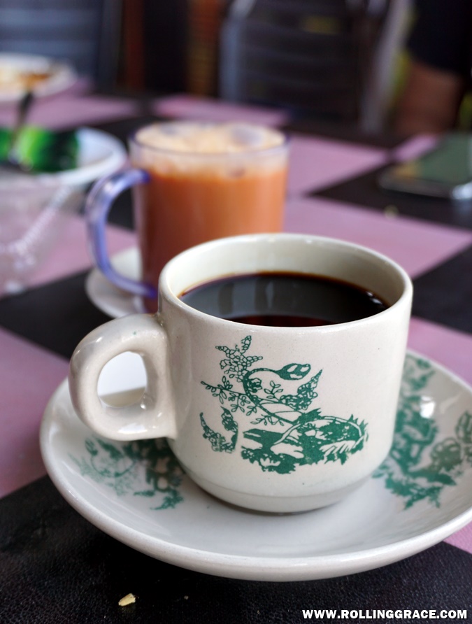 Cup of local Kopi-O black coffee served at Warung Tepi Sawah Kangar Perlis Malaysia