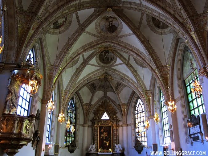 How to Be an Ethical Traveller: 5 Ways to Make a Difference 6 Ornate interior of a historic church with vaulted ceiling, respecting religious sites while travelling