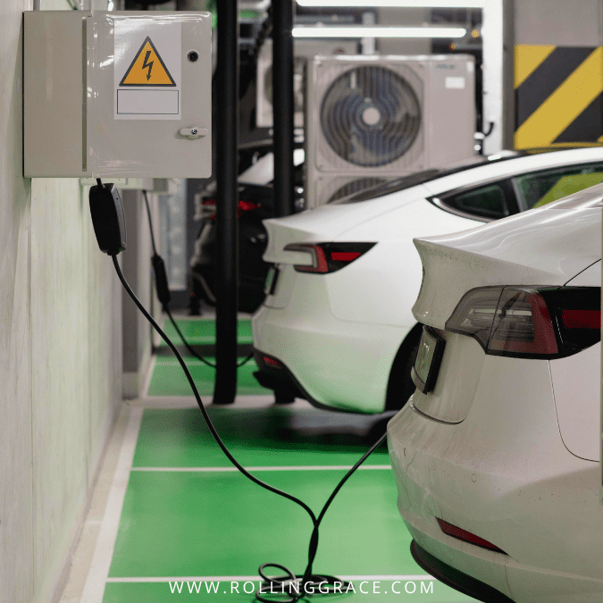 White electric vehicle charging at an urban EV charging station in a covered car park