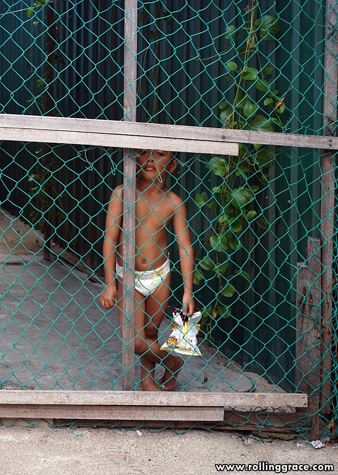 Young Bajau Laut child at Kampung Mabul village on Pulau Mabul, Sabah