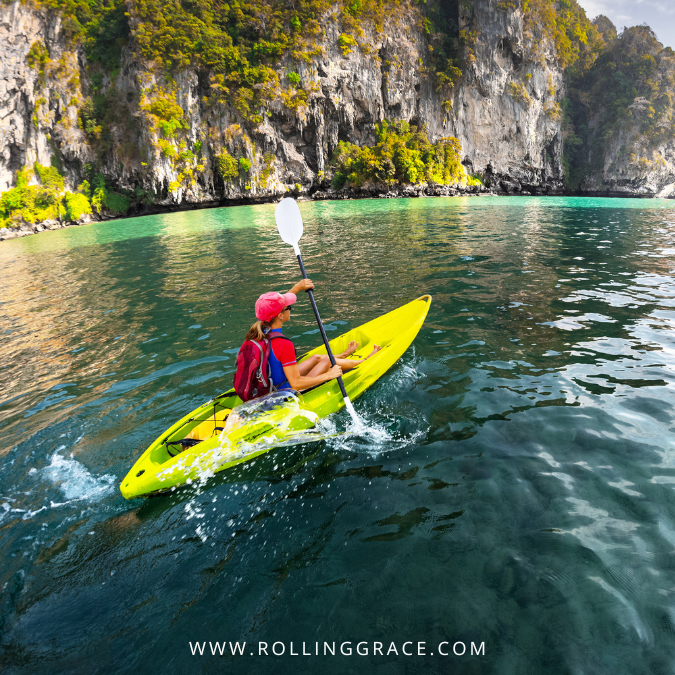Where to Kayak in Malaysia: 10 Best Spots for Every Level 4 A solo kayaker in a yellow kayak navigating through the Kubang Badak Mangrove River in Langkawi, Malaysia