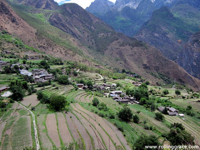 https://rollinggrace.com/wp-content/uploads/2026/03/tiger-leaping-gorge-yunnan-mountain-village.jpg