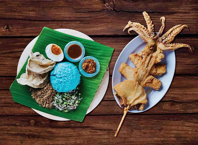Deep-fried giant squid served with blue nasi kukus and sambal at Restoran Nasi Kukus Sotong Besar Klang