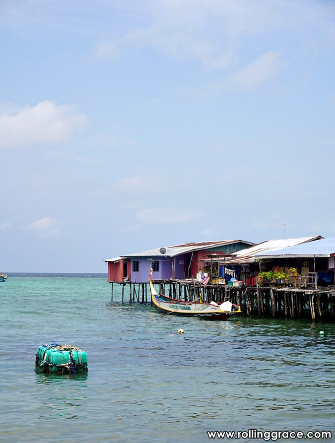 Bajau Laut colourful stilt houses built over the sea at Pulau Mabul Sabah Malaysia