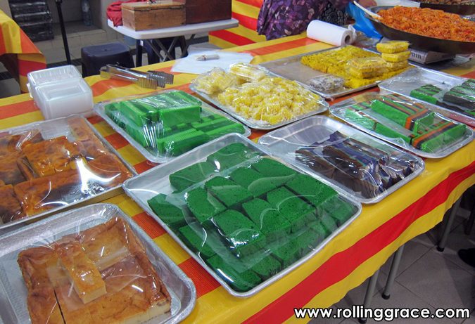 Trays of colourful traditional Bruneian kuih and cakes displayed for sale at Gadong Night Market