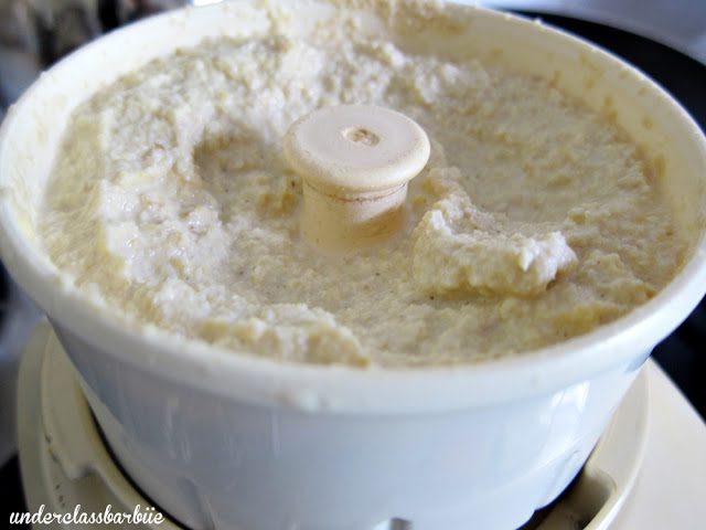 Creamy and Easy Hummus Recipe at Home in 15 Minutes 8 Freshly blended thick and creamy hummus in a container ready to be served or stored