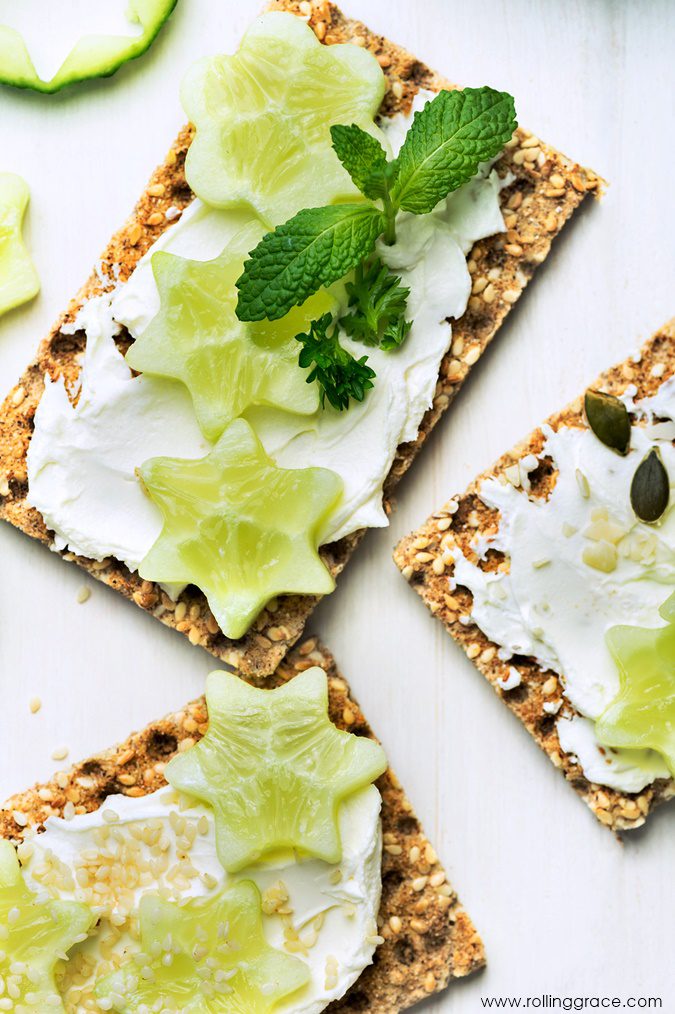 Crispy homemade wholegrain seed crackers topped with fresh vegetables on a white surface Thick blueberry smoothie bowl topped with sliced banana, berries, and chia seeds is one of the Ways to Eat Chia Seeds