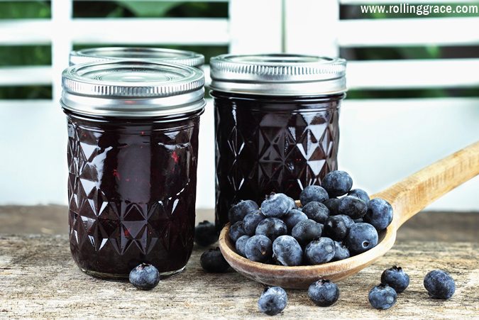 Jars of homemade blueberry chia seed jam with fresh blueberries scattered around them Thick blueberry smoothie bowl topped with sliced banana, berries, and chia seeds is one of the Ways to Eat Chia Seeds