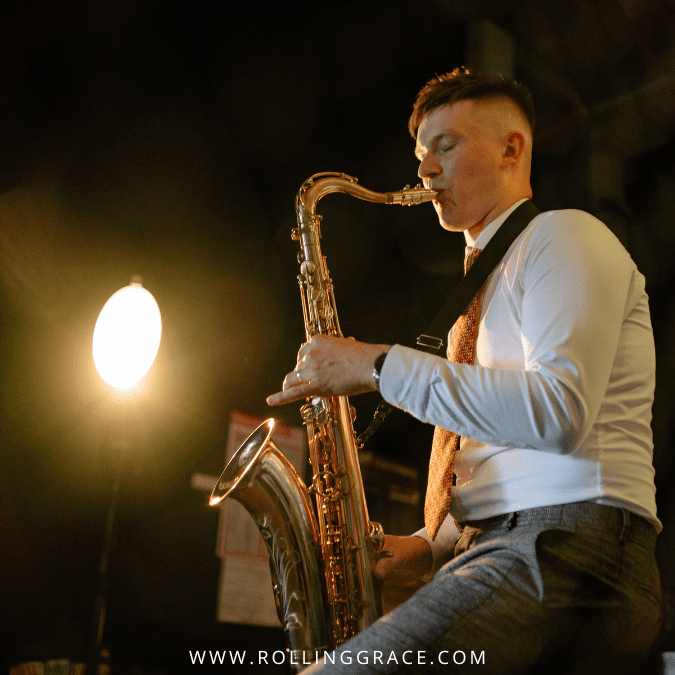 A saxophonist performing on stage at the Hua Hin International Jazz Festival in Thailand