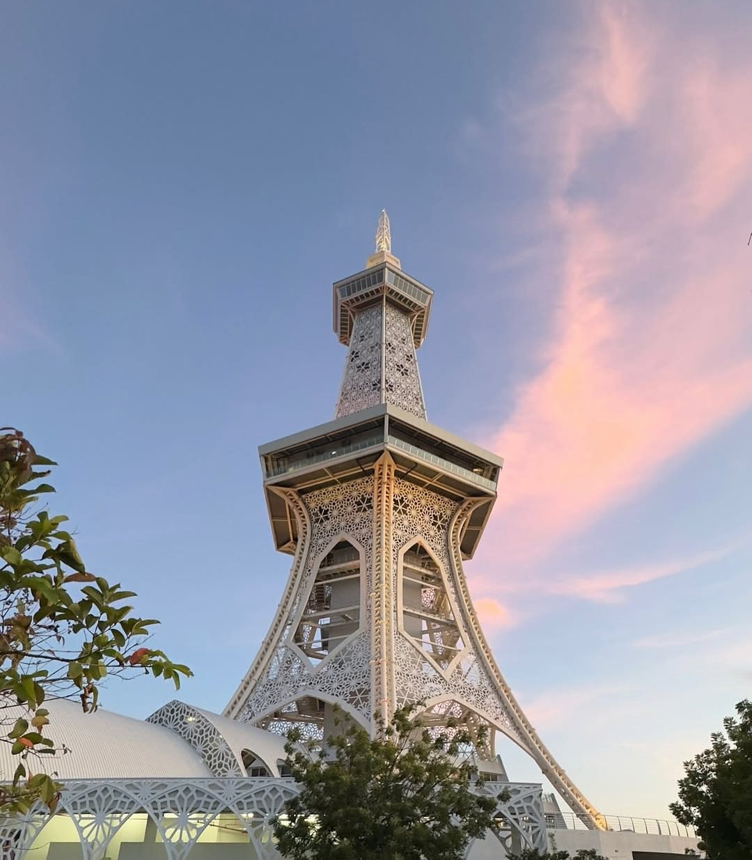 Maha Tower standing 138 metres tall against a blue sky in Kuah, a top attraction and thing to do in Langkawi