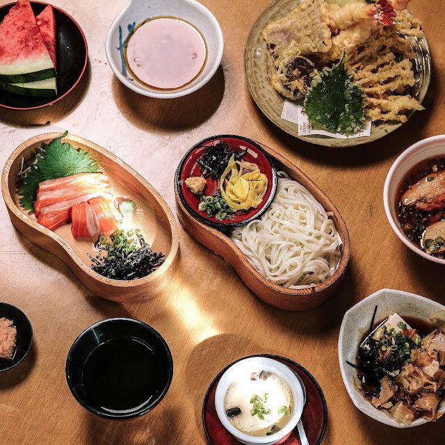 8 Best Empire Damansara Food Spots for Serious Flavours 5 Home-style Japanese bento set with sushi and sashimi served in a cozy wooden interior