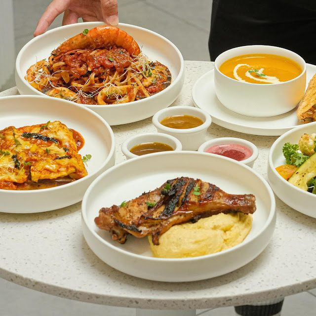 8 Best Empire Damansara Food Spots for Serious Flavours 9 Soft shell chilli crab pasta and buttery croissants served at the minimalist Whitesand Cafe