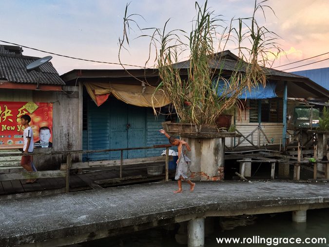 Colourful wooden houses built on stilts over the Klang River at Bagan Hailam fishing village, Port Klang, Selangor.