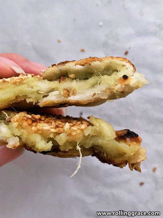 5 Tips to Make the Perfect Chinese Sweet Potato Pancakes 6 Chinese sweet potato pancake pulled apart showing golden yellow Beni Nagomi filling.