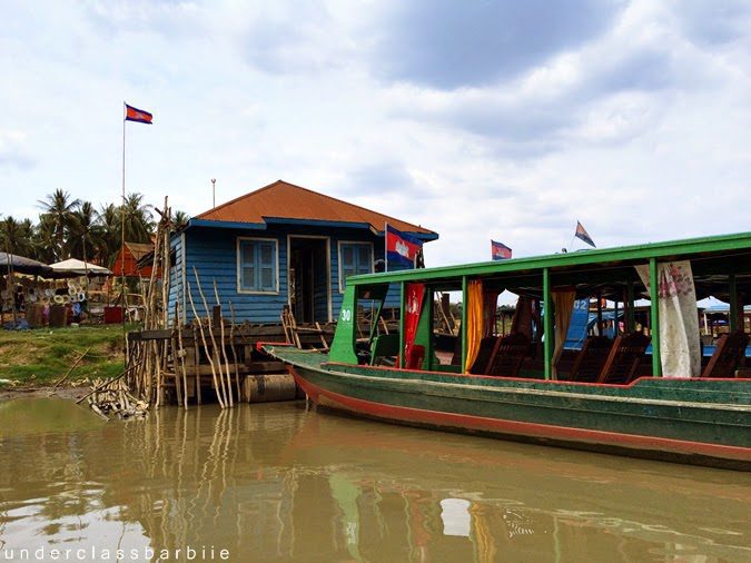1-Day Kampong Khleang Itinerary: Best Attractions & Tips 9 Wooden boats moored at the jetty of Kampong Khleang floating village, Siem Reap, Cambodia.