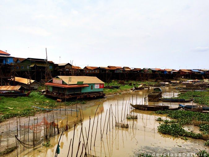 1-Day Kampong Khleang Itinerary: Best Attractions & Tips 5 Water channel running through Kampong Khleang floating village with stilt houses on both sides, Cambodia.