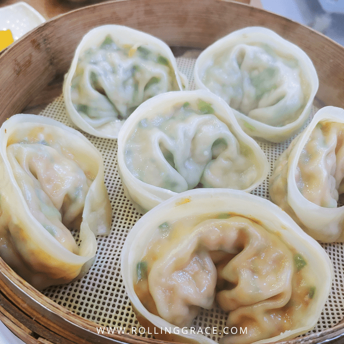 20 Best Dumplings in the World You Need to Try at Least Once 17 Korean mandu dumplings filled with kimchi and tofu served fried and steamed on a plate.