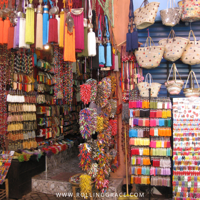 Brightly coloured textiles and goods hanging in the narrow lanes of Naif Souk, Deira, Dubai.
