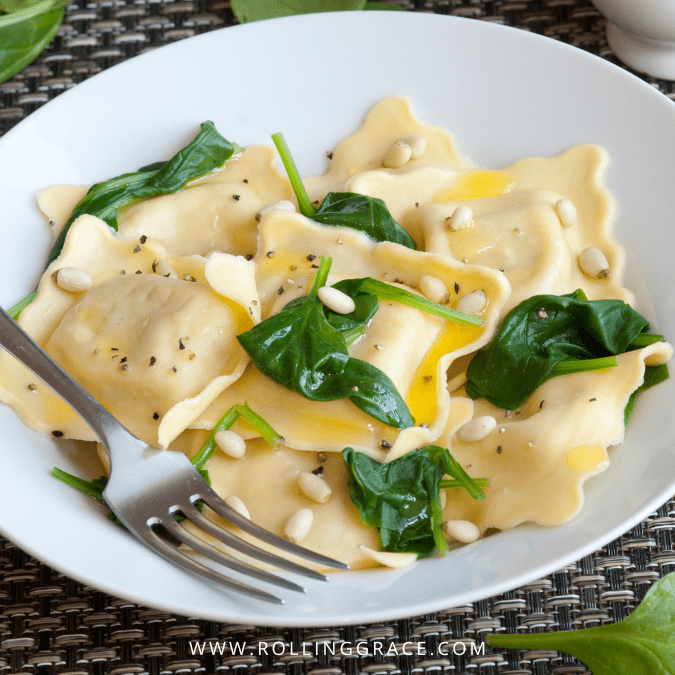 20 Best Dumplings in the World You Need to Try at Least Once 3 Fresh Italian ravioli pasta dumplings filled with ricotta and spinach on a plate in Italy.
