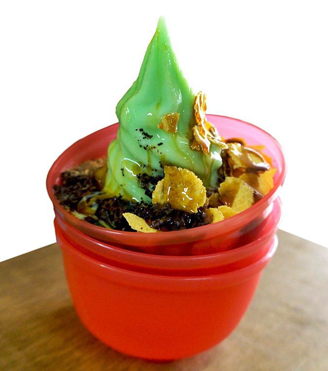 Pandan Gula Apong ice cream in red cup at R.G. Ais Krim Bergula Apong, Tower Market, Kuching, Sarawak