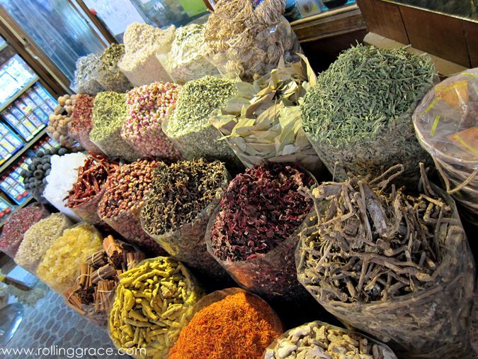 Colourful open sacks of spices, herbs and dried goods at the Spice Souk in Deira, Dubai.